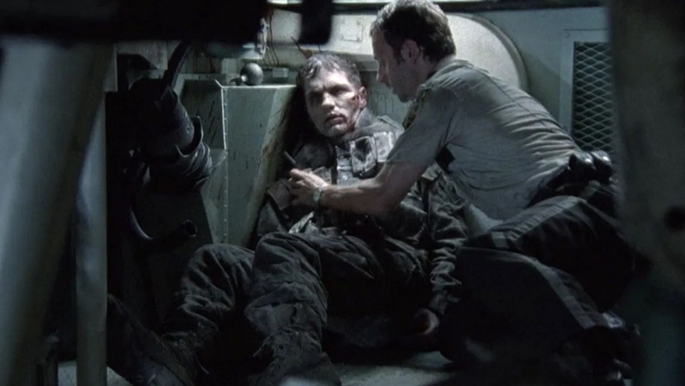 Rick Grimes (Andrew Lincoln) and a zombie (Sam Witwer) in The Walking Dead