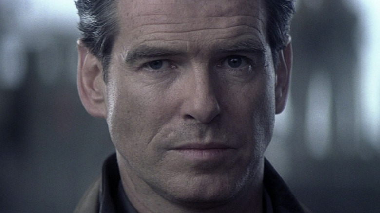 Pierce Brosnan seriously stares ahead