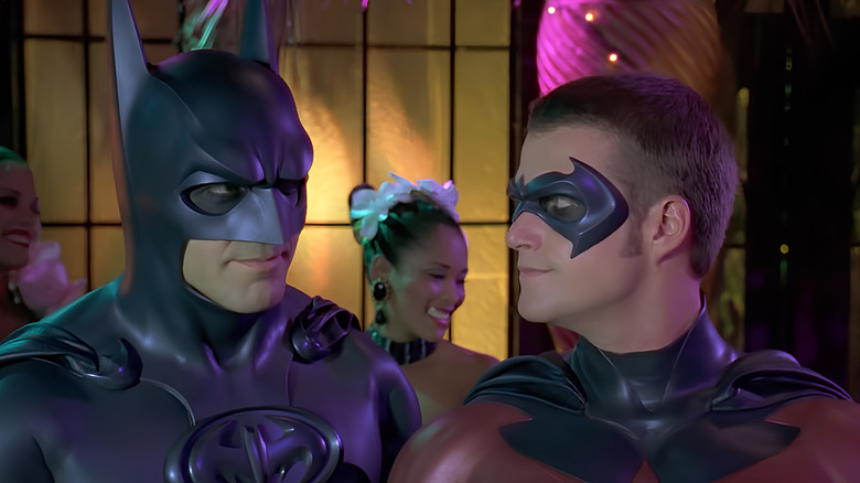 Robin smirks at Batman