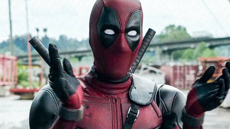 Deadpool clapping his hands