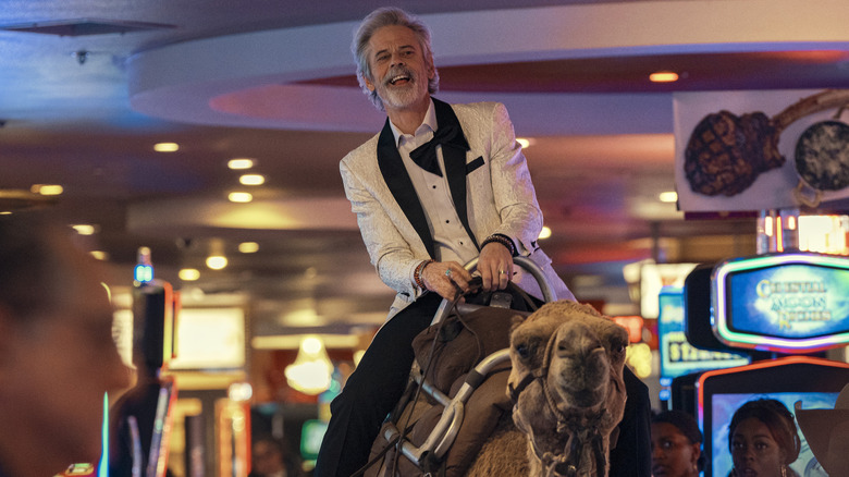 Haggerty riding camel in casino