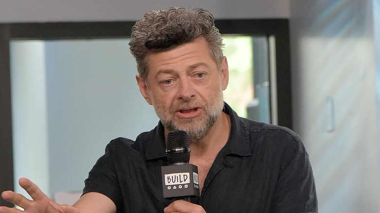 Andy Serkis talking into microphone