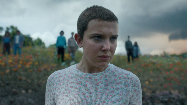 Eleven stares resolutely